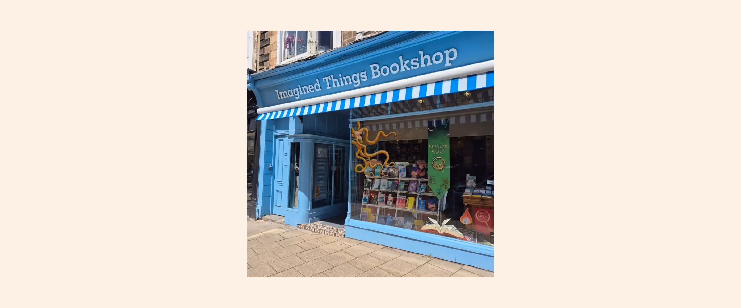 Exterior shot of Imagined Things Bookshop, Harrogate, painted a vibrant light blue.