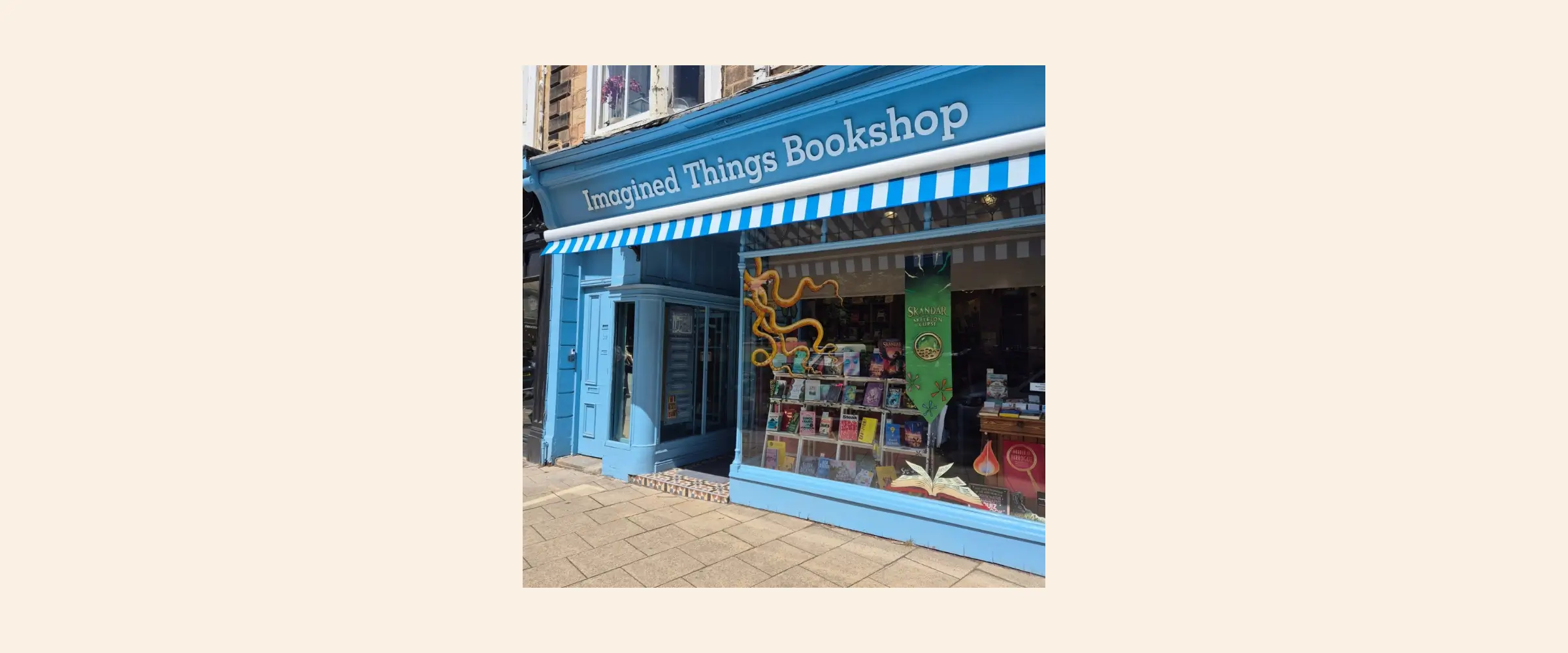 Exterior shot of Imagined Things Bookshop, Harrogate, painted a vibrant light blue.
