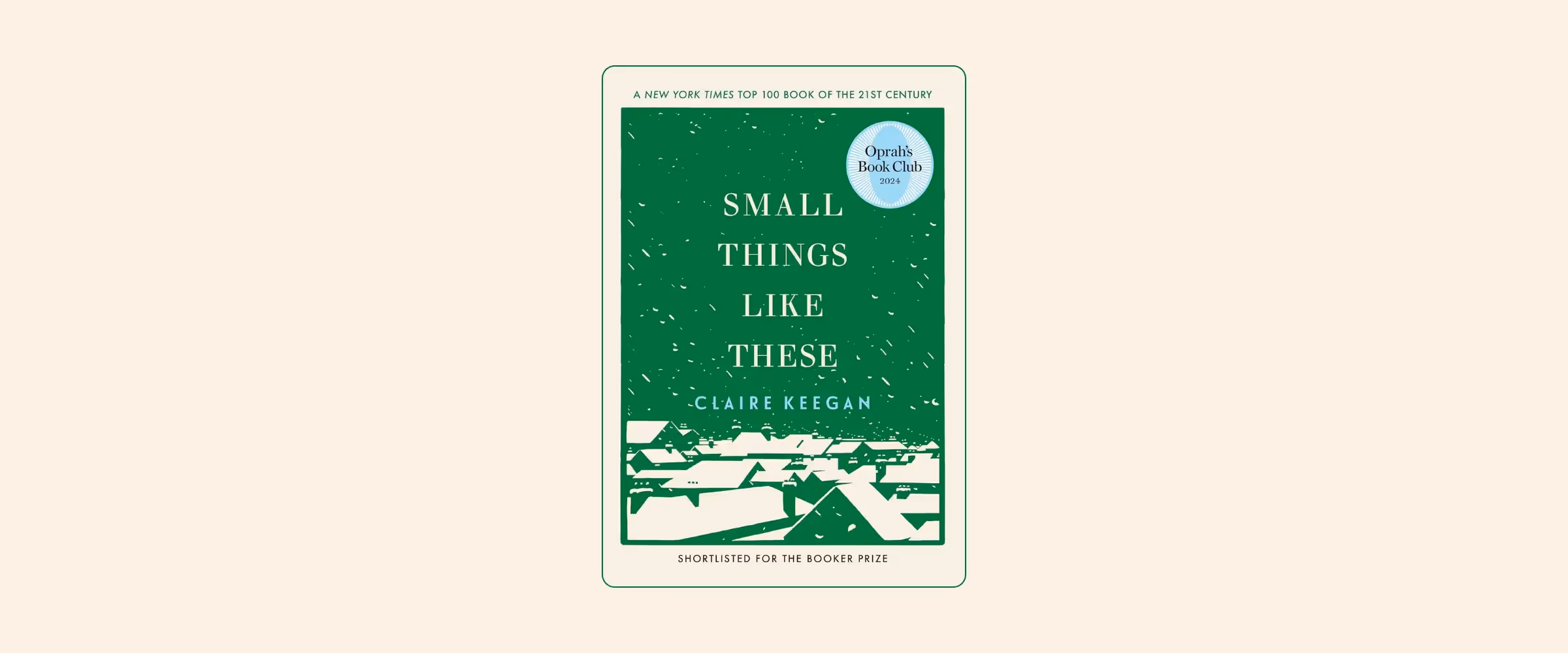 A green book called "Small Things Like These" by Claire Keegan is shown with snowy roofs