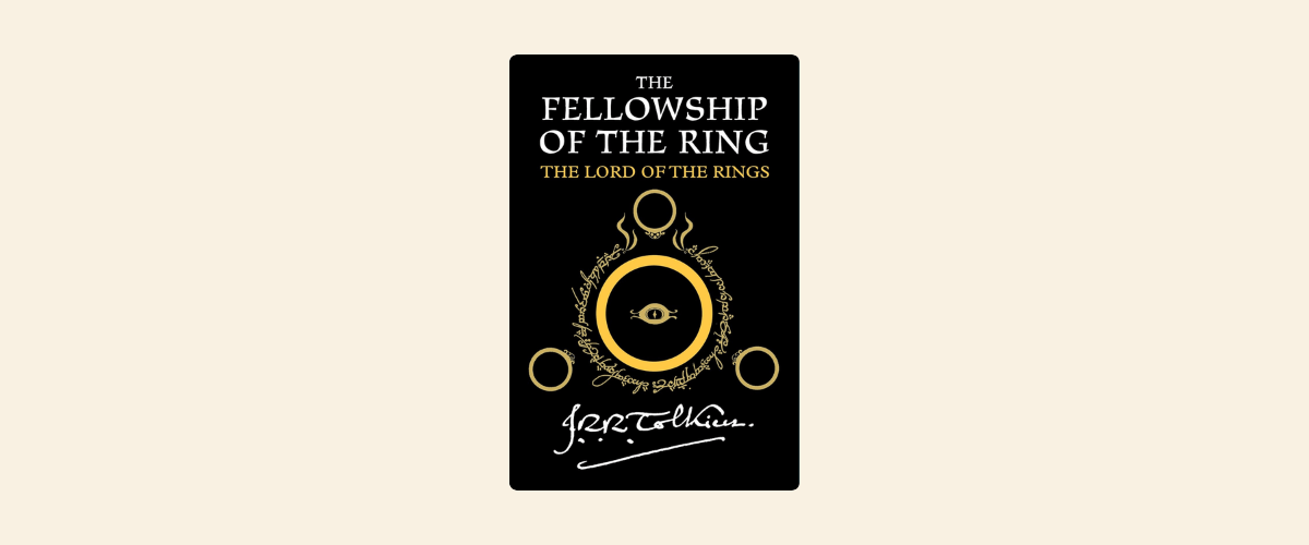 A book of Lord of the Rings: The Fellowship of The Ring is displayed.