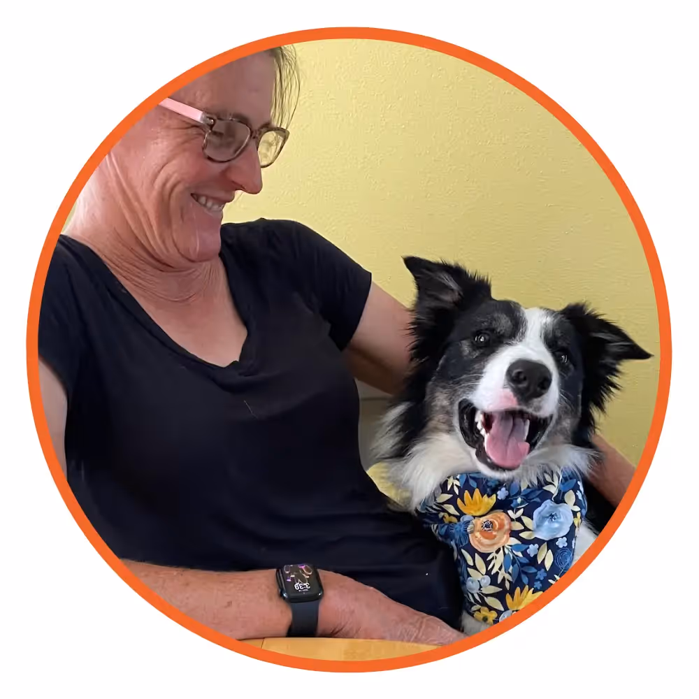 An image of reviewer Christie Henry and her dog 