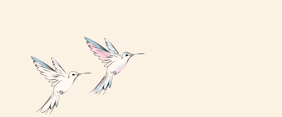 Two birds are flying together.
