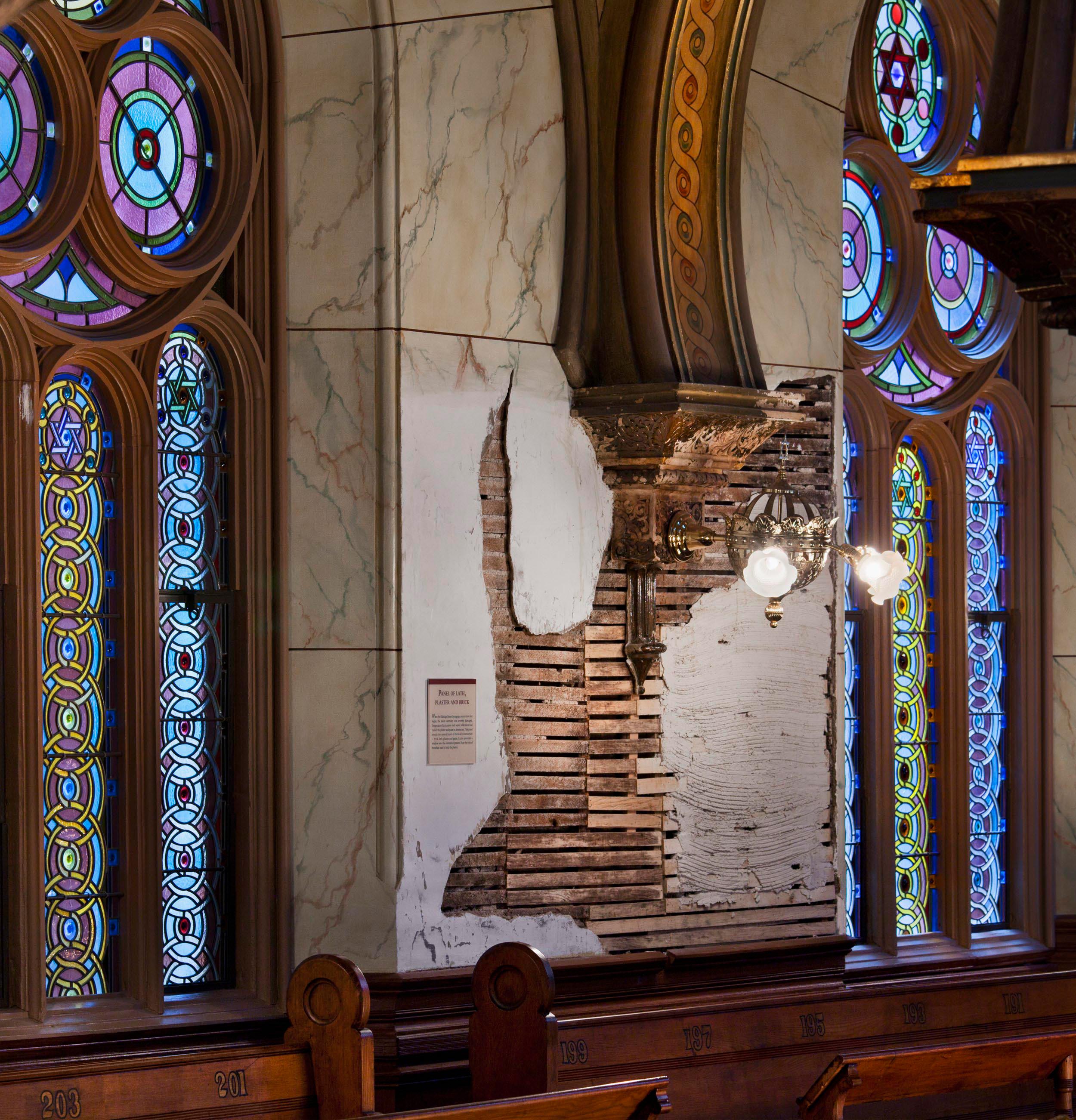 An unfinished wall of the synagogue shows how much work was done to complete the restoration.