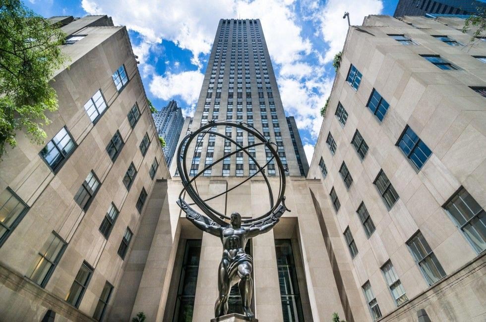 Rockefeller Center looms large in view over the iconic bronze "Atlas" statue.