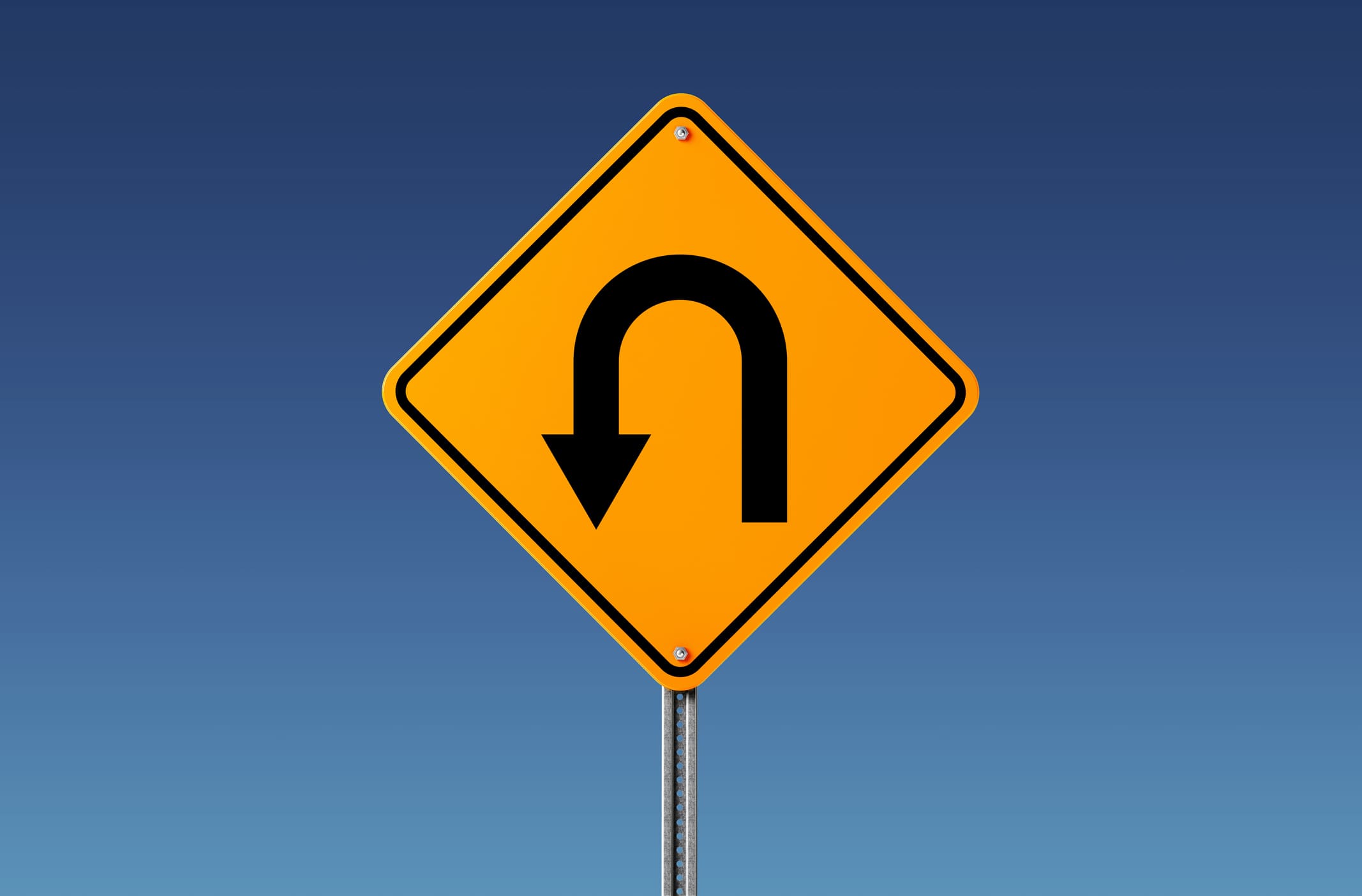 yellow traffic sign with half turn arrow on a blue background