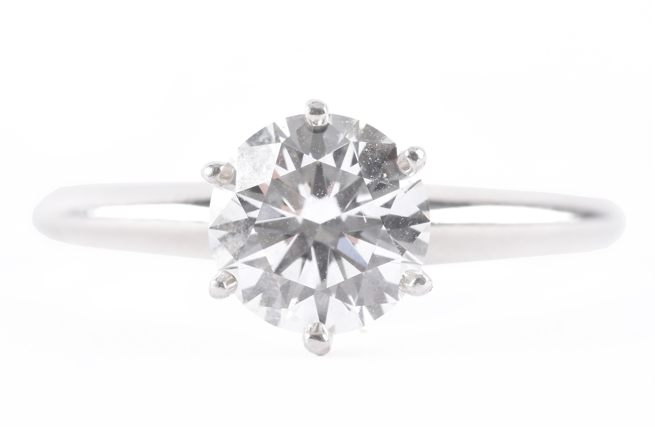 Round brilliant-cut diamond solitaire engagement ring sold at Aubreys