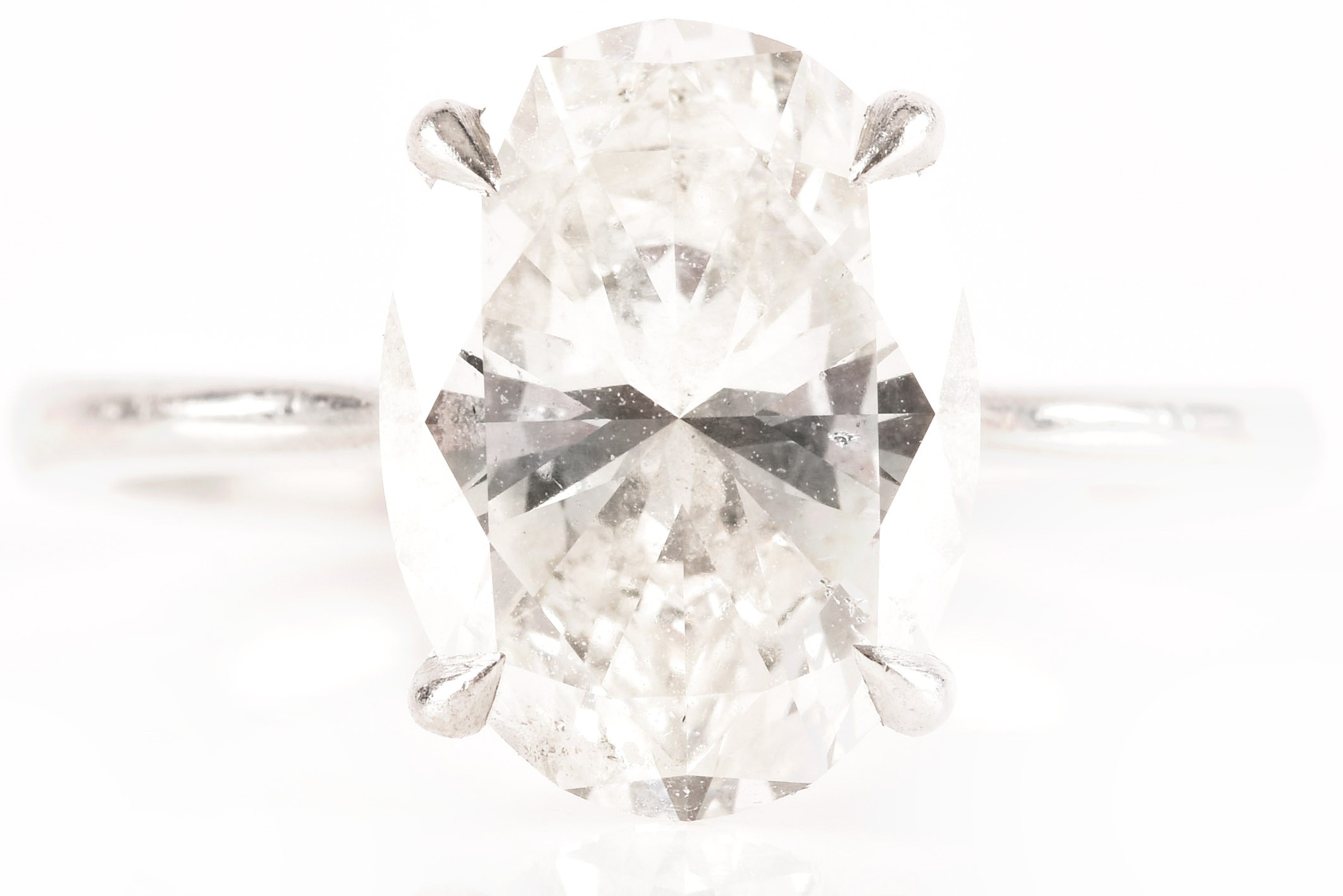 Oval-cut diamond solitaire ring in platinum