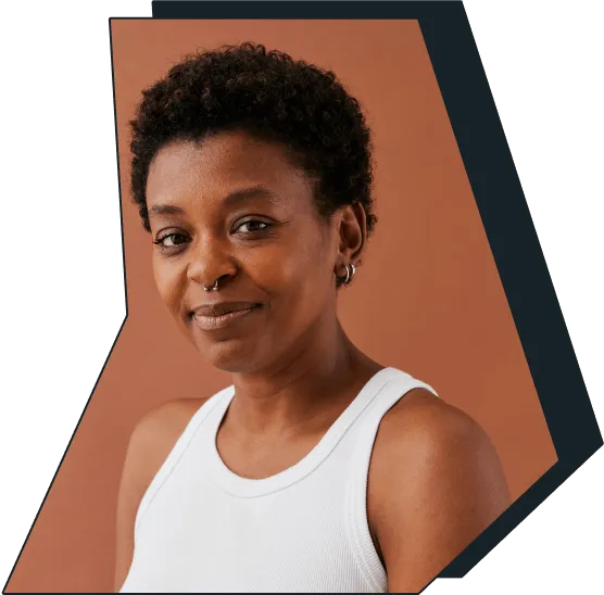 An image of a young woman smiling at the camera.