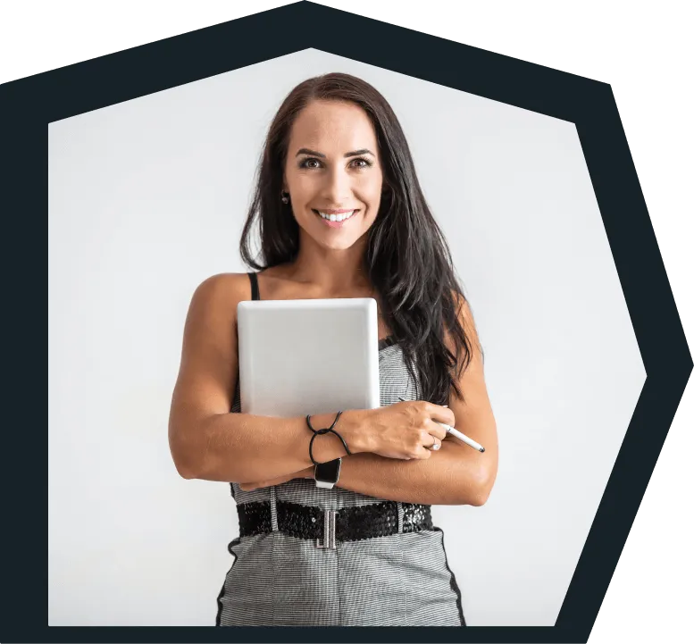 An image of a young woman smiling at the camera. 