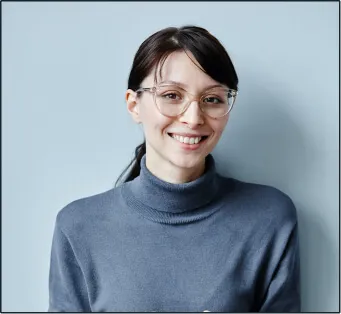 A headshot image of a young woman. 