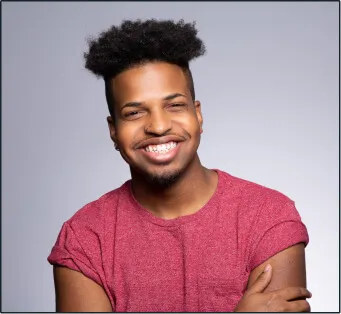 A headshot image of a young man. 