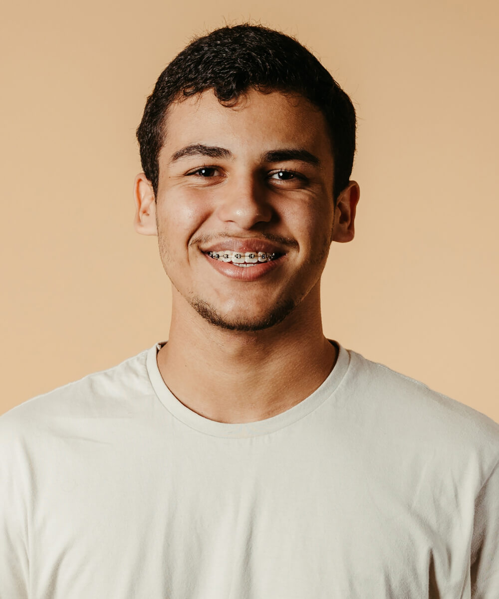 A headshot image of a young man. 