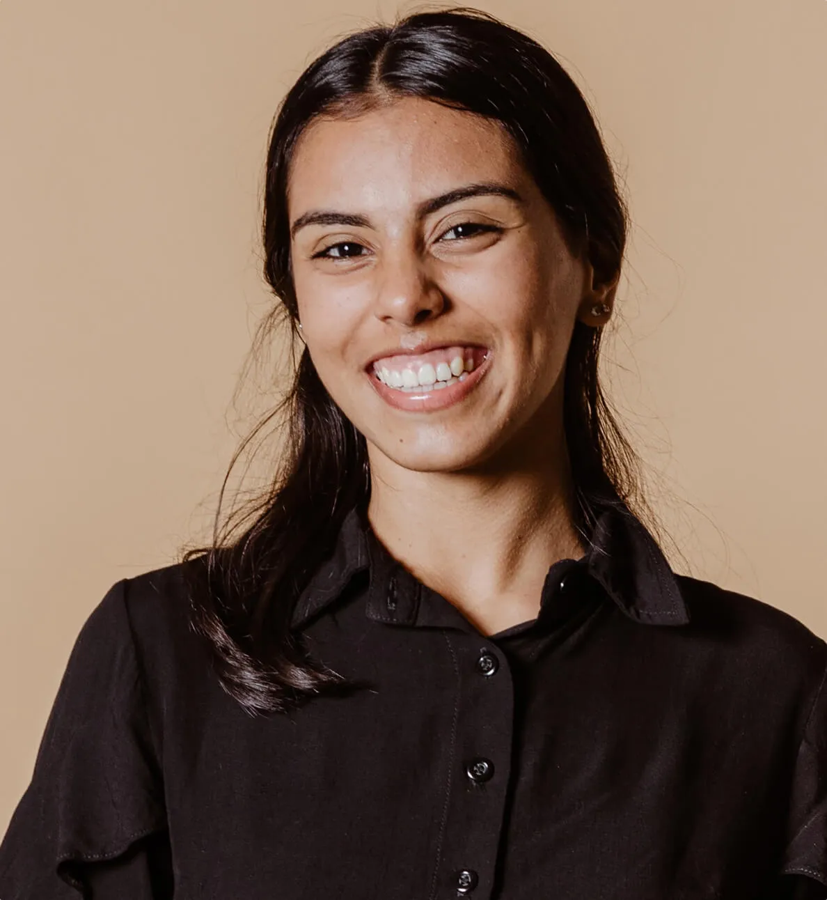 A headshot image of a young woman. 