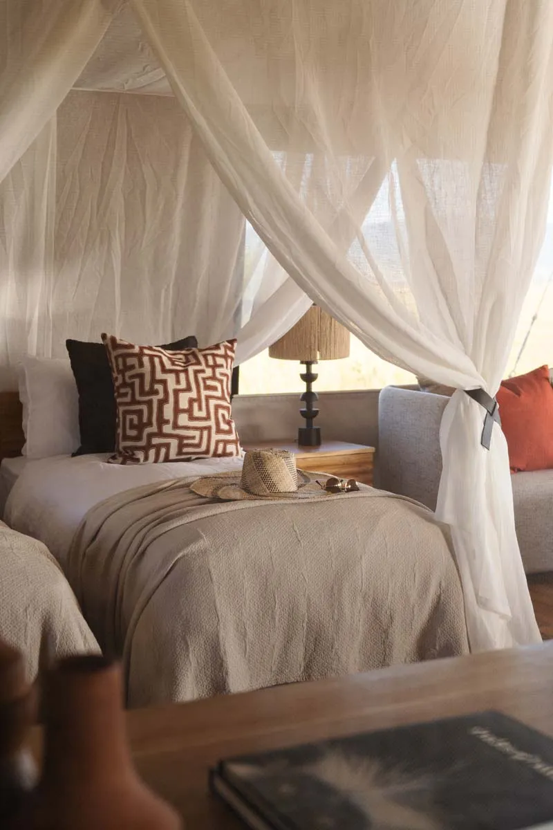 A canopy bed at Sisini Serengeti nature camp in Africa. 