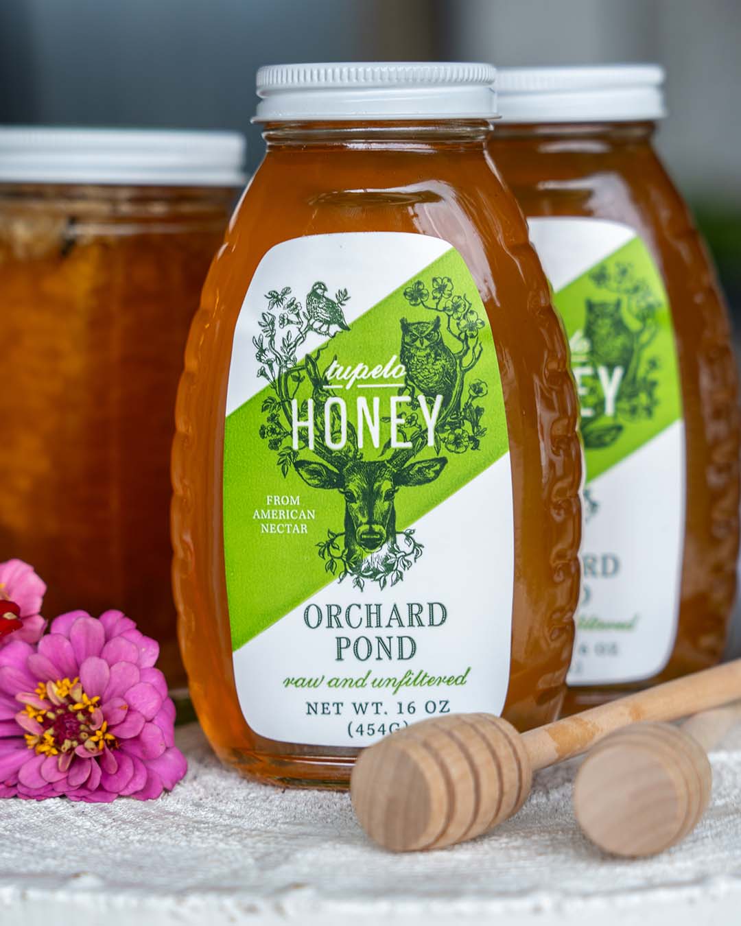 Professional photography shoot of jars of honey from Orchard Pond Farms
