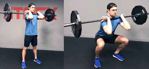 Man with blue shirt doing front squat