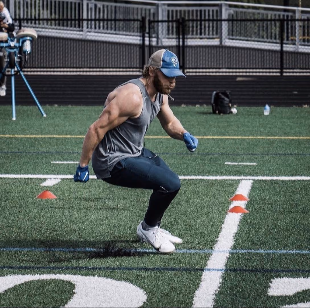 Man with cap doing drills