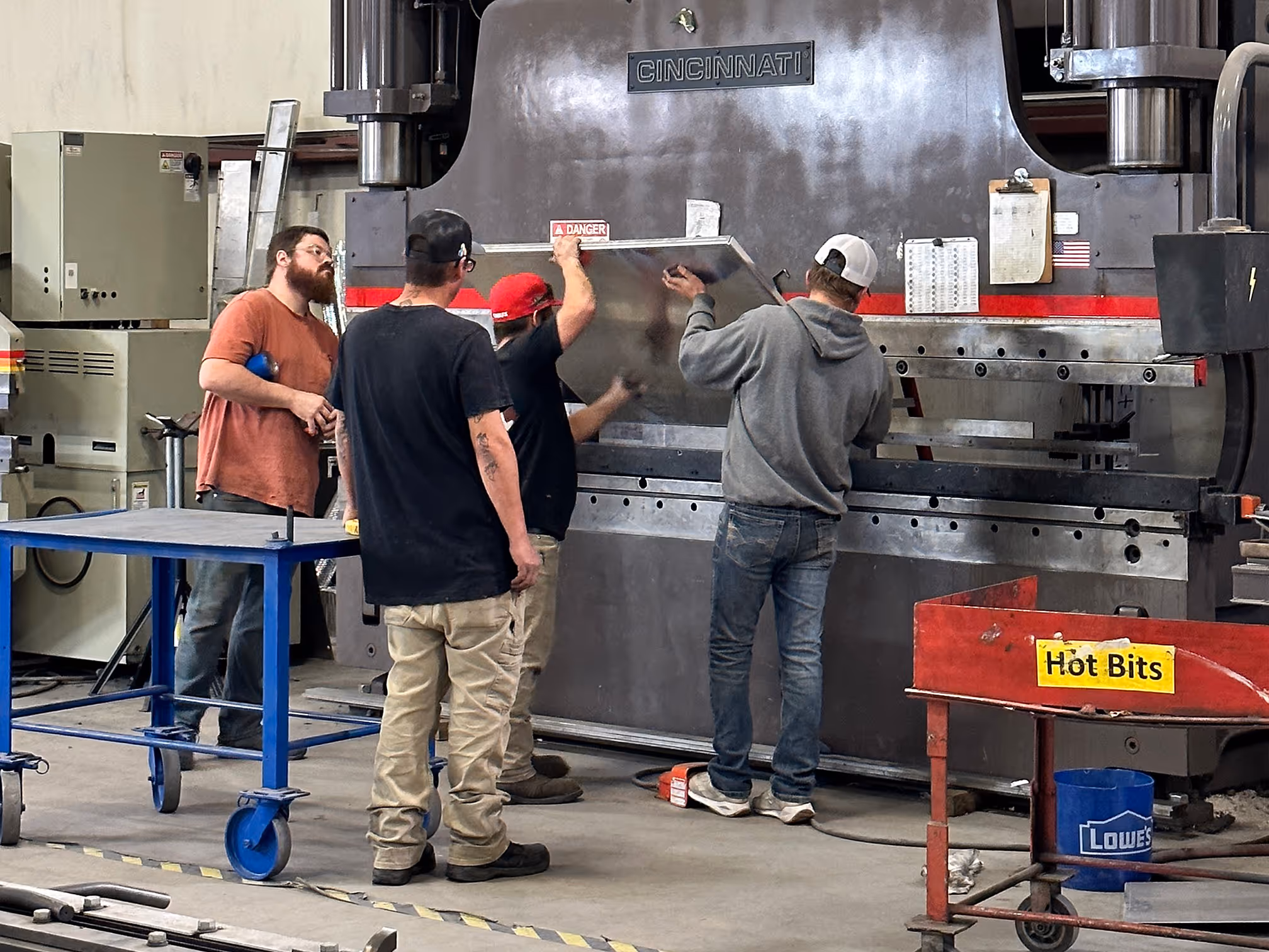 CME employees work to install a new multizone unit
