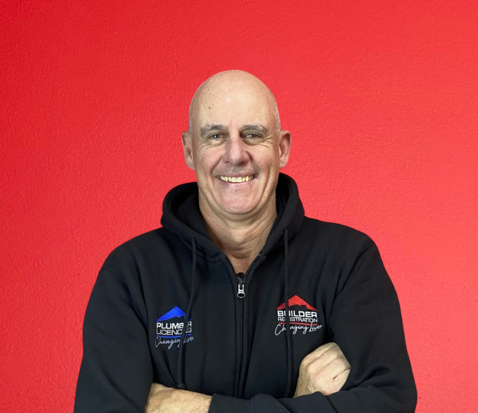 Troy smiling wearing black BR shirt