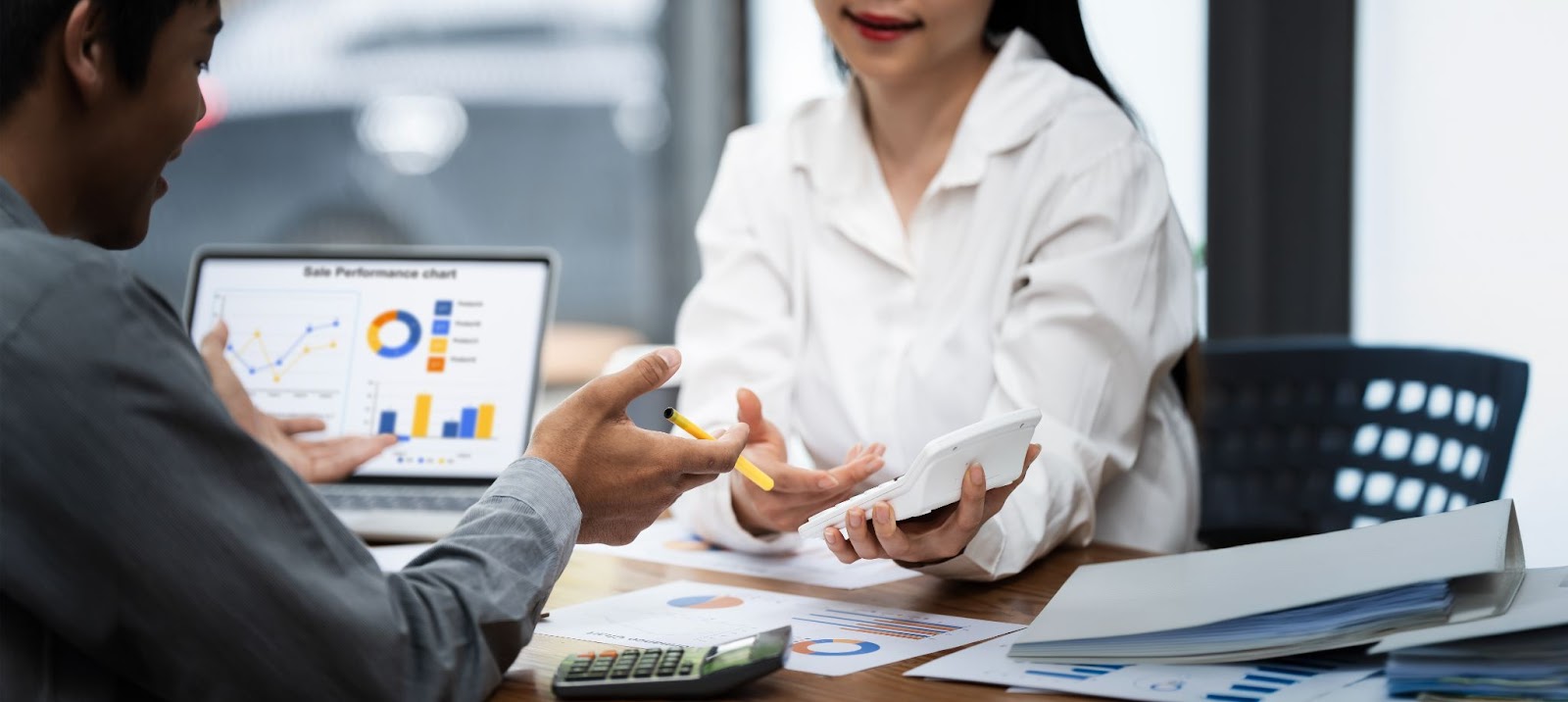 professionals discussing revenue