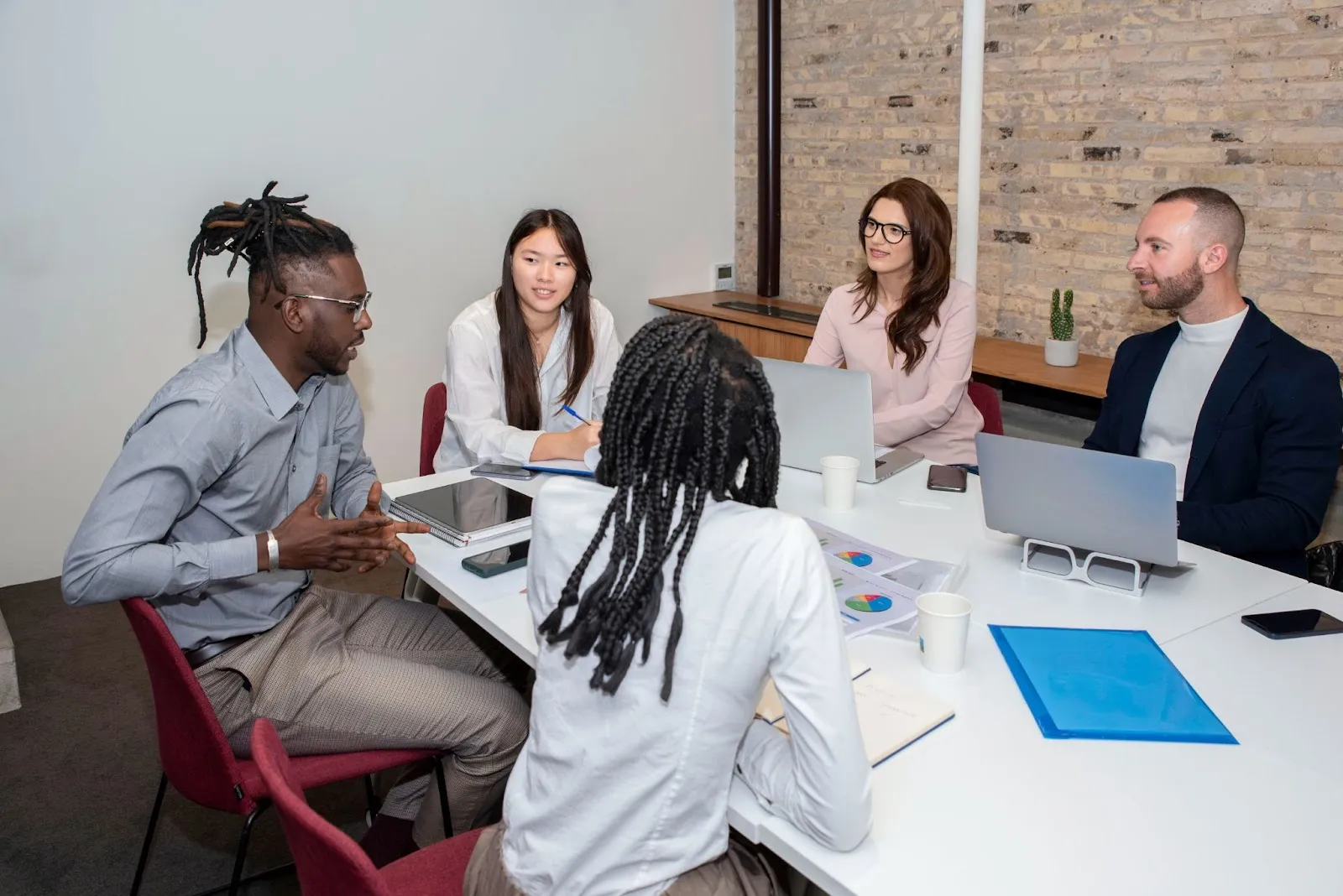 team discussing business insights