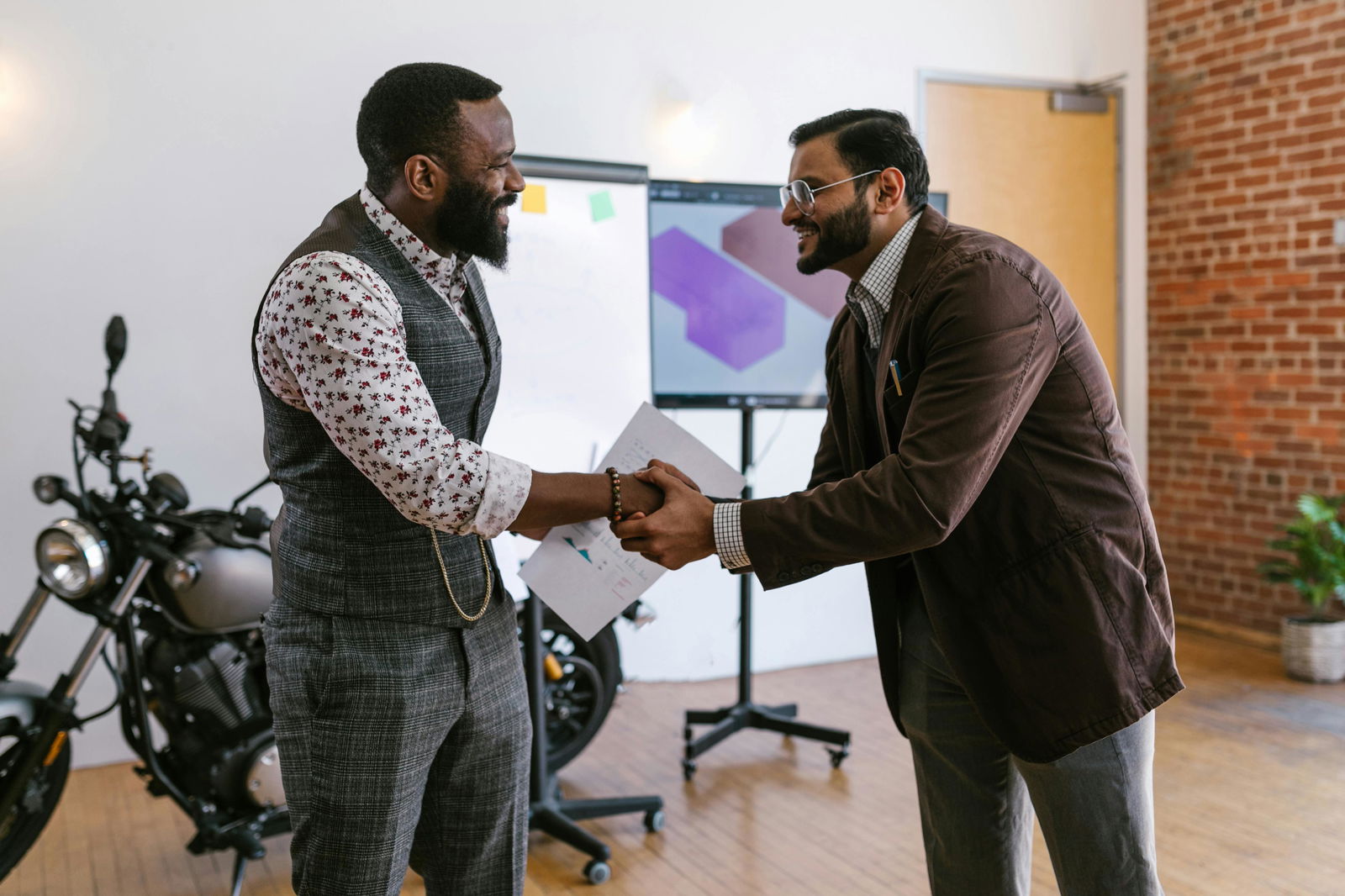 Two men shaking hands.