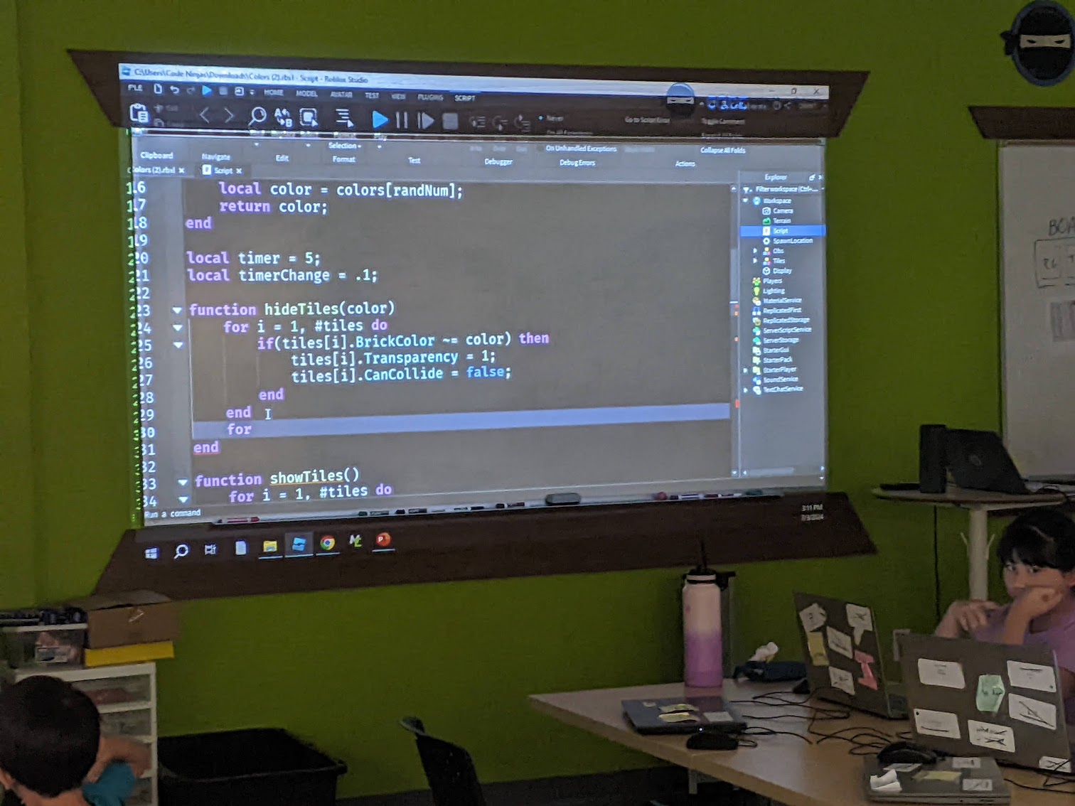 Ninja learning to code at summer camp
