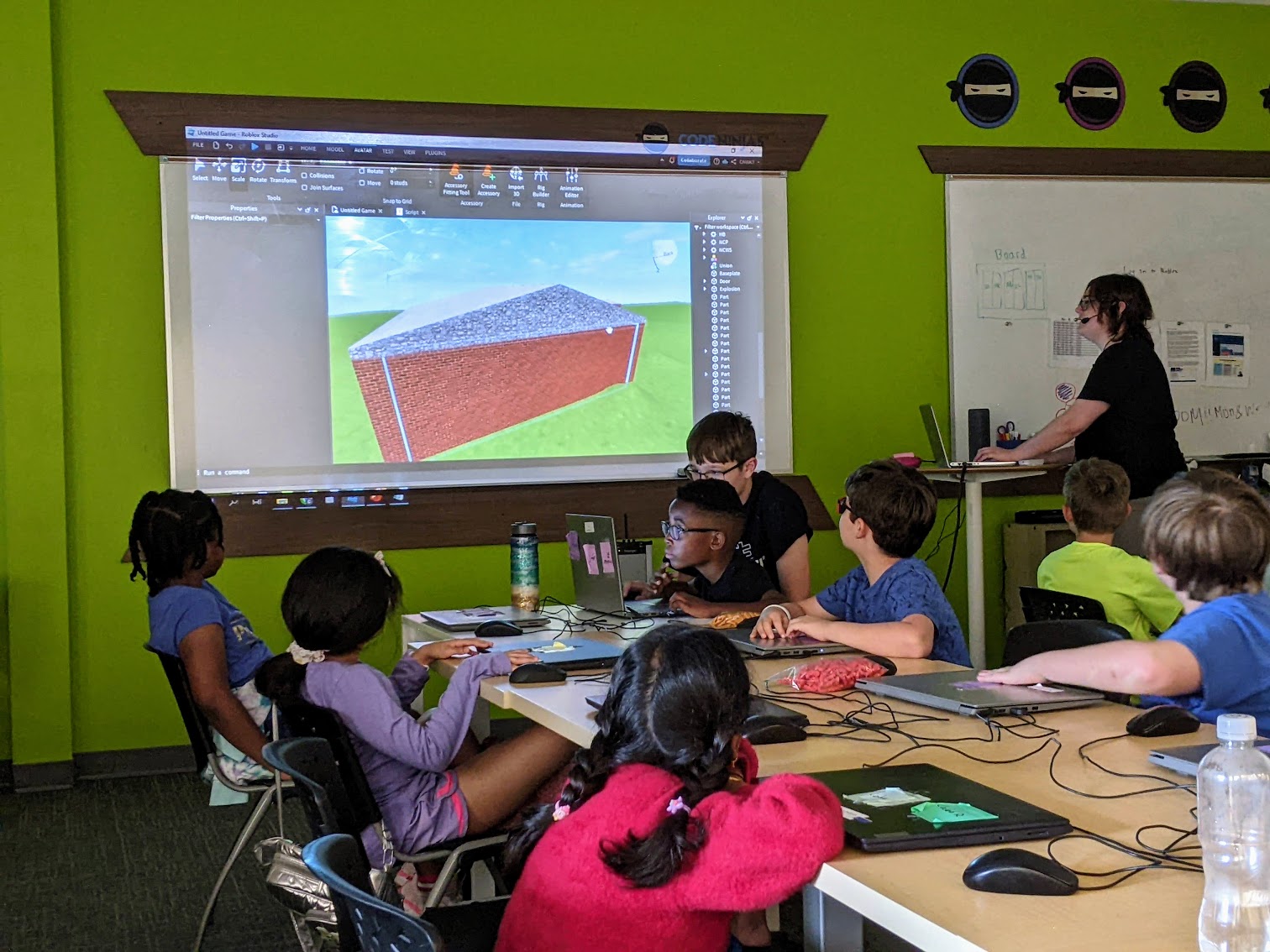 Campers building together at the dojo