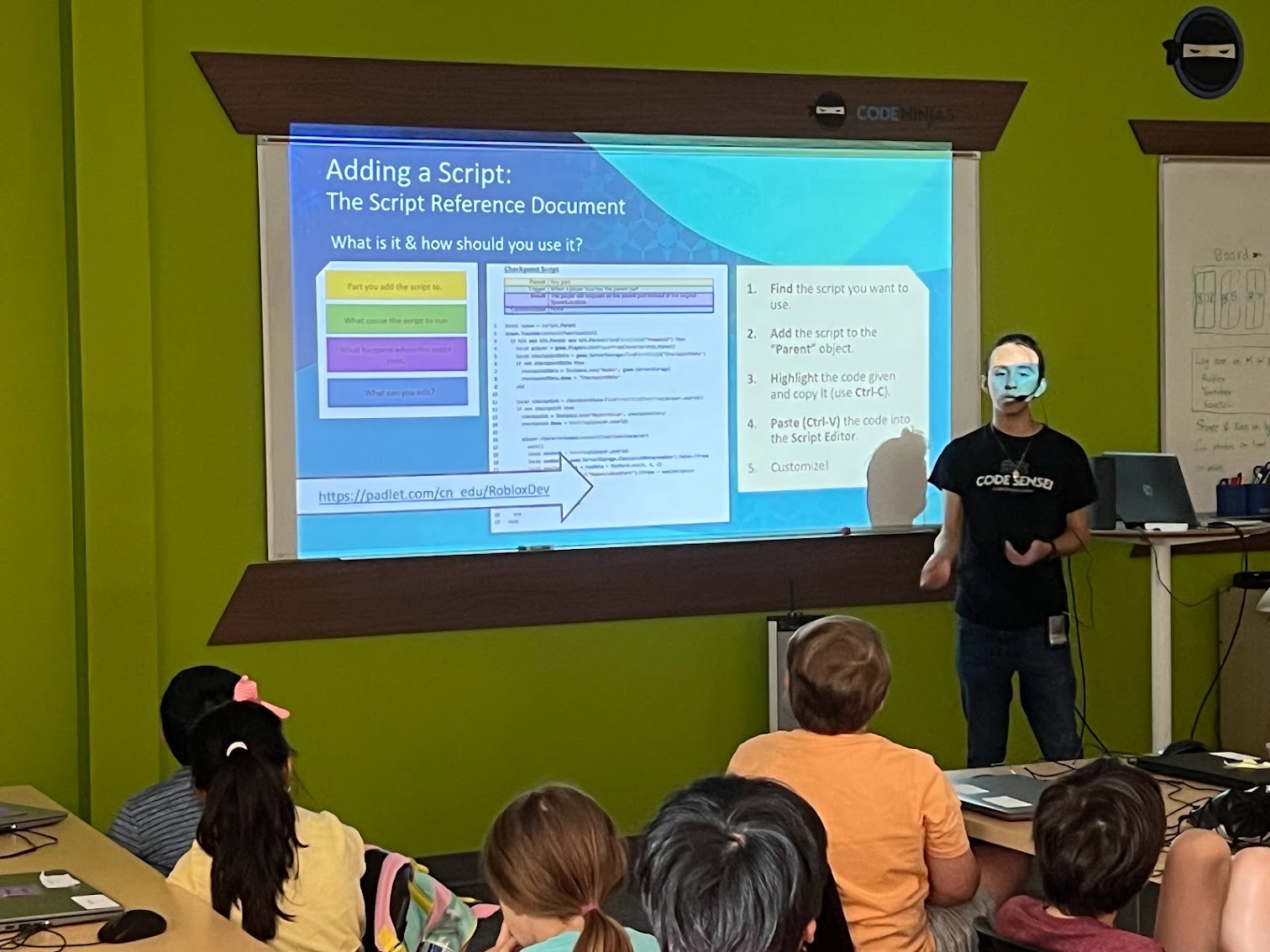 Sensei teaching campers at Code Ninjas