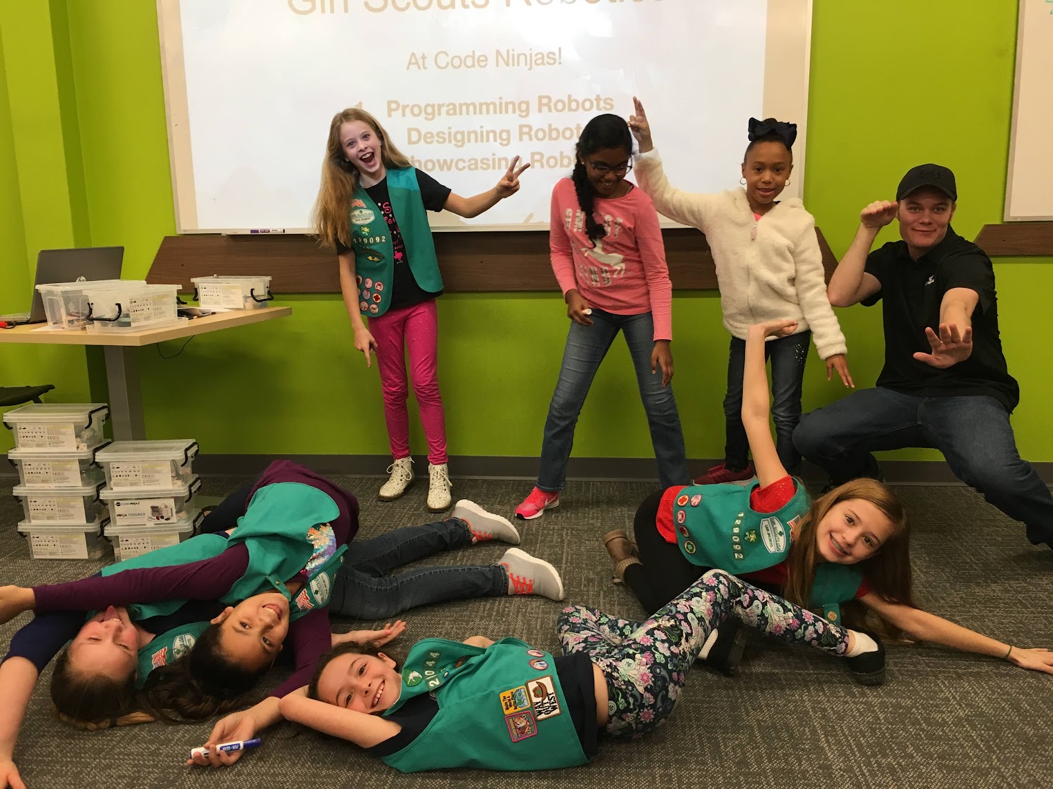 Scouts learning to code in a group session