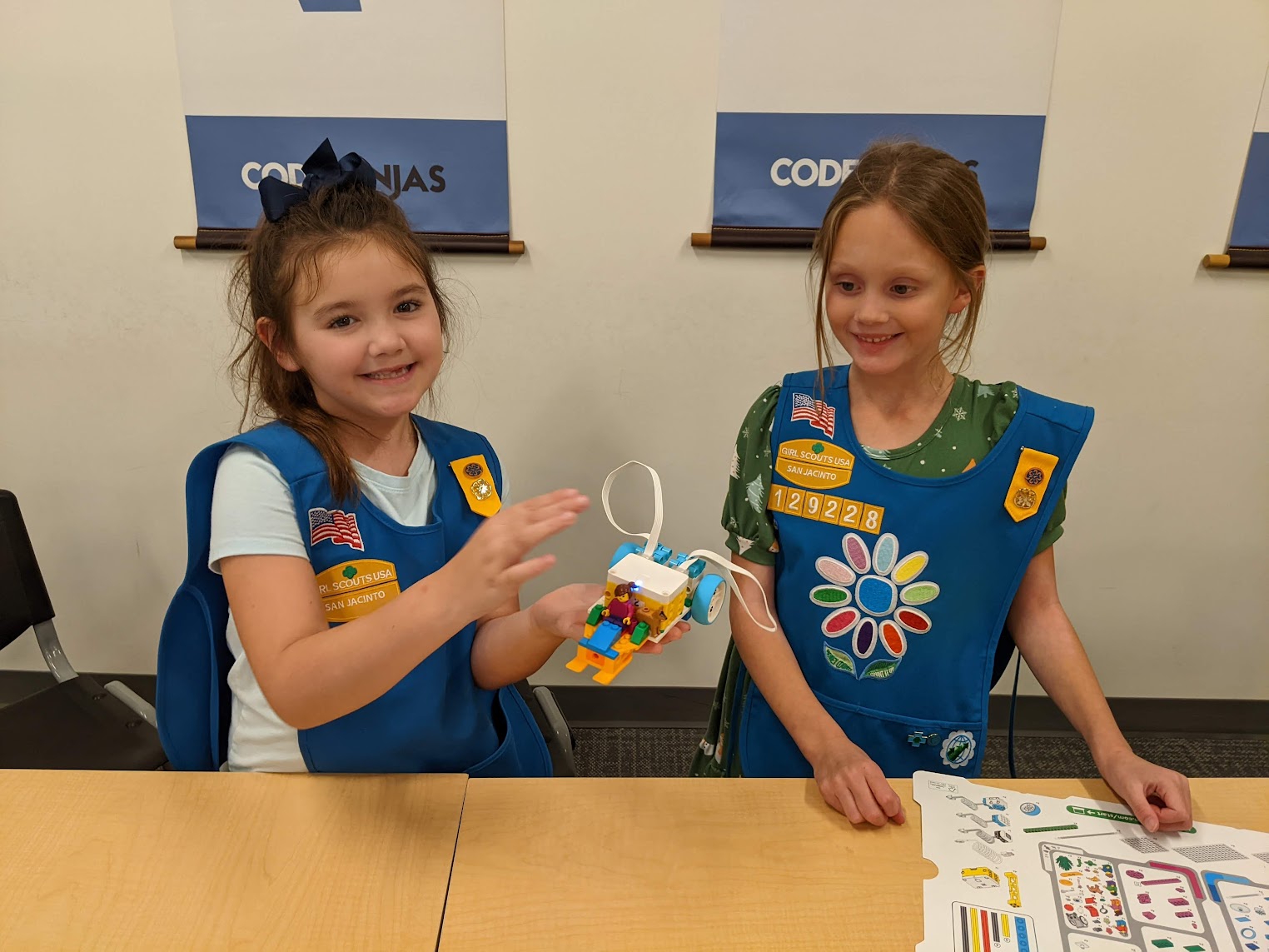 Scouts smiling after completing a coding badge