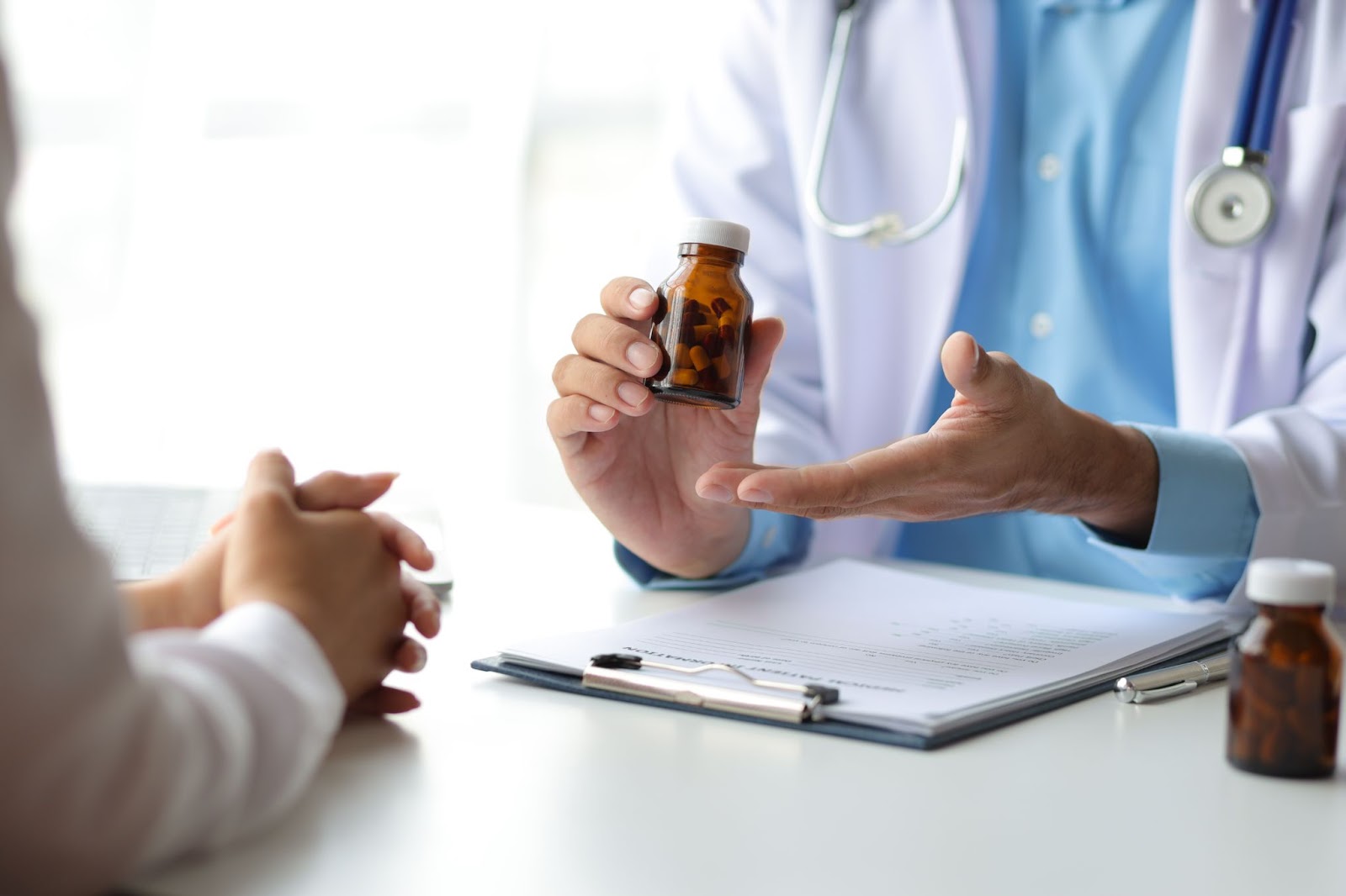 Cropped shot of a doctor explaining the benefits of a semaglutide medication to a patient during a consultation.