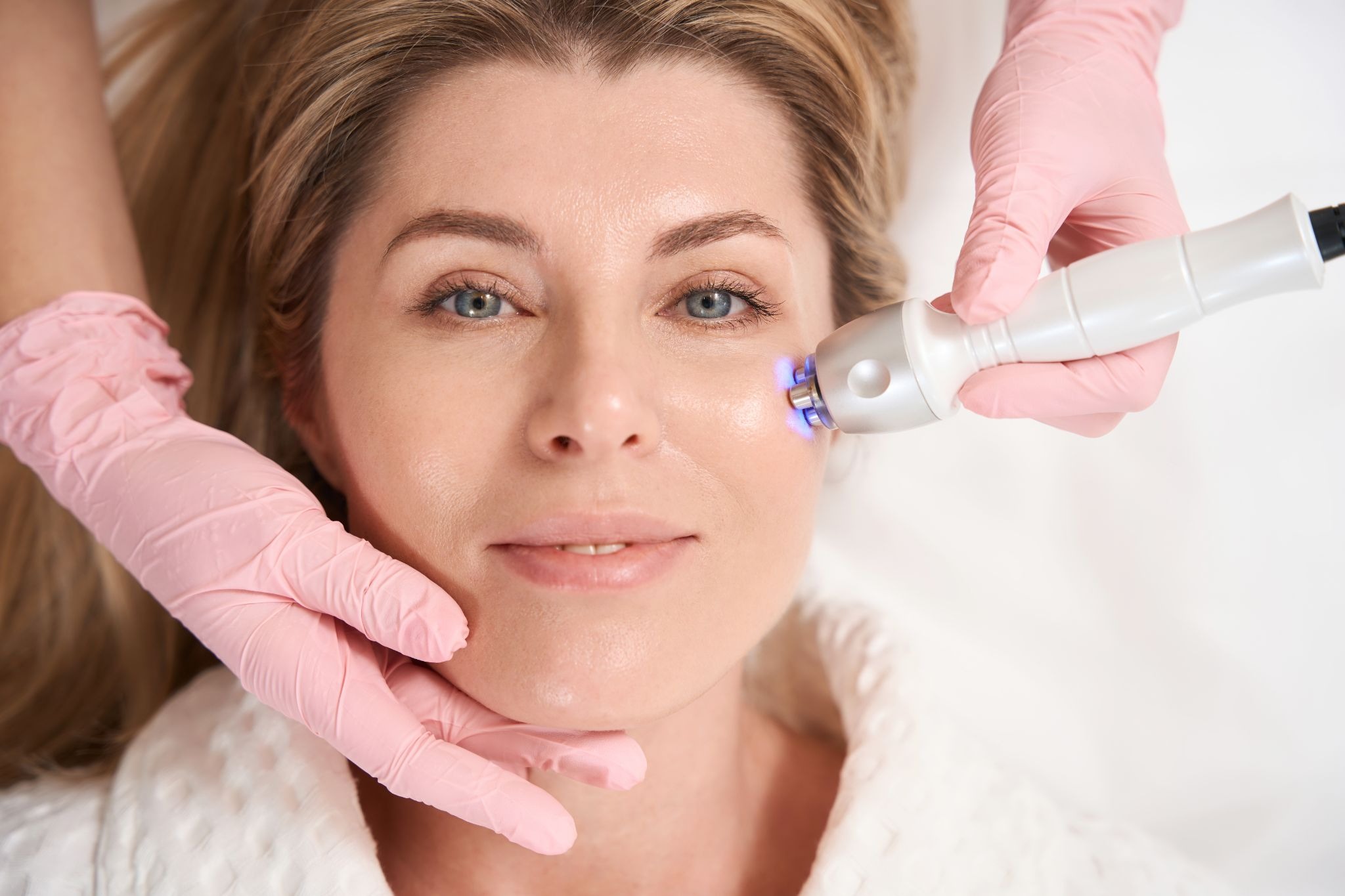 Woman undergoing skincare treatment for a smoother, wrinkle-free appearance