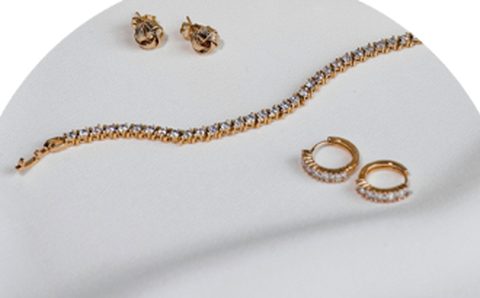 Gold and diamond earrings and tennis bracelet