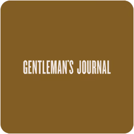 Gentleman's Journal text in white on a brown square background with rounded corners.