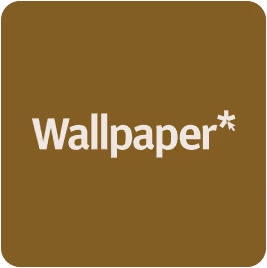 Wallpaper text with an asterisk on a brown square background with rounded corners.