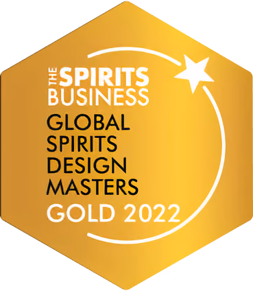 Gold hexagonal award badge for The Spirits Business Global Spirits Design Masters Gold 2022.