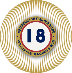 Round gold emblem with vertical lines, featuring a central circle with the number 18 and the text 'Coachbuilt 18 Year Old Blend Williams Racing FMB'.