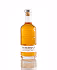 Tall clear glass bottle filled with amber liquid and topped with a cork stopper.