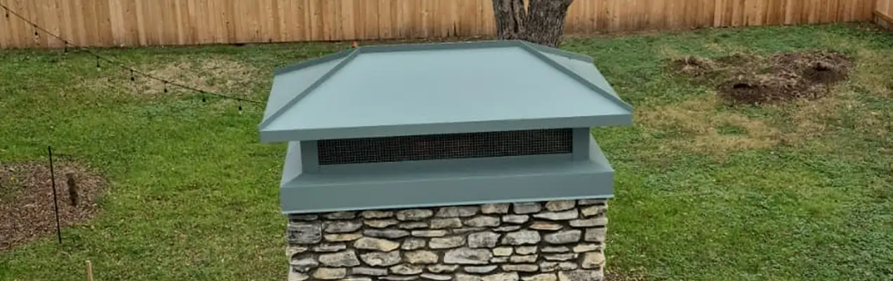 Professional chimney inspection performed by a certified technician on a residential roof