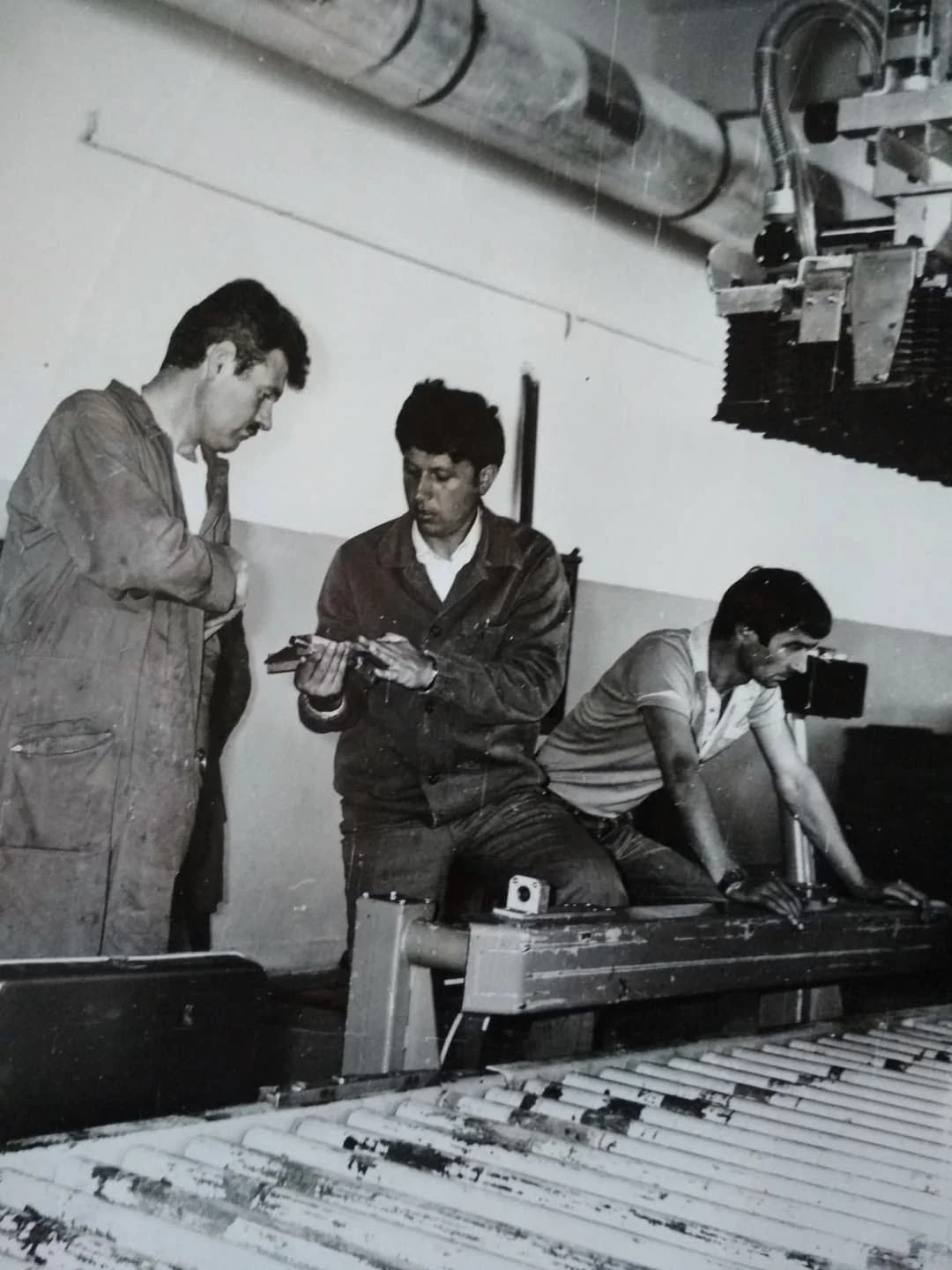 An archival photograph of the team at work in the winery