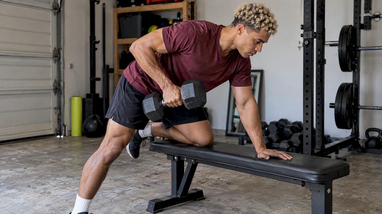 Man performing a one-arm dumbbell row