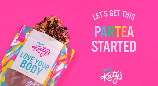Katy's tea bag open and spilling out on a bright pink background with the Katy's logo