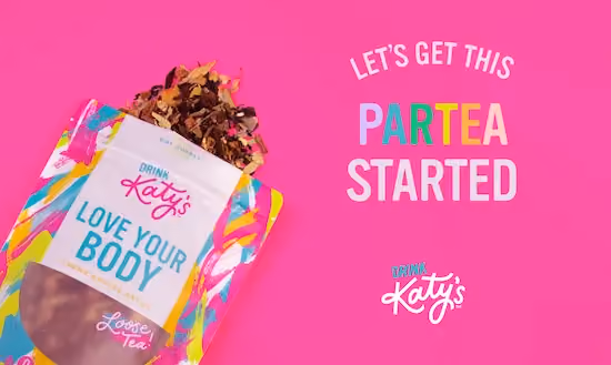 Katy's tea bag open and spilling out on a bright pink background with the Katy's logo