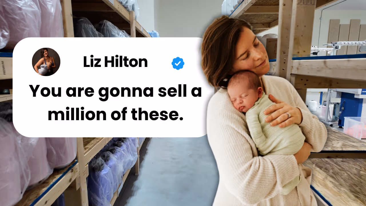 Liz Hilton, founder of KnitIt, holding her baby in her manufacturing facility in Holland, Michigan, with the NASA logo visible in the background, representing her journey from NASA writer to $3.5M baby product entrepreneur.