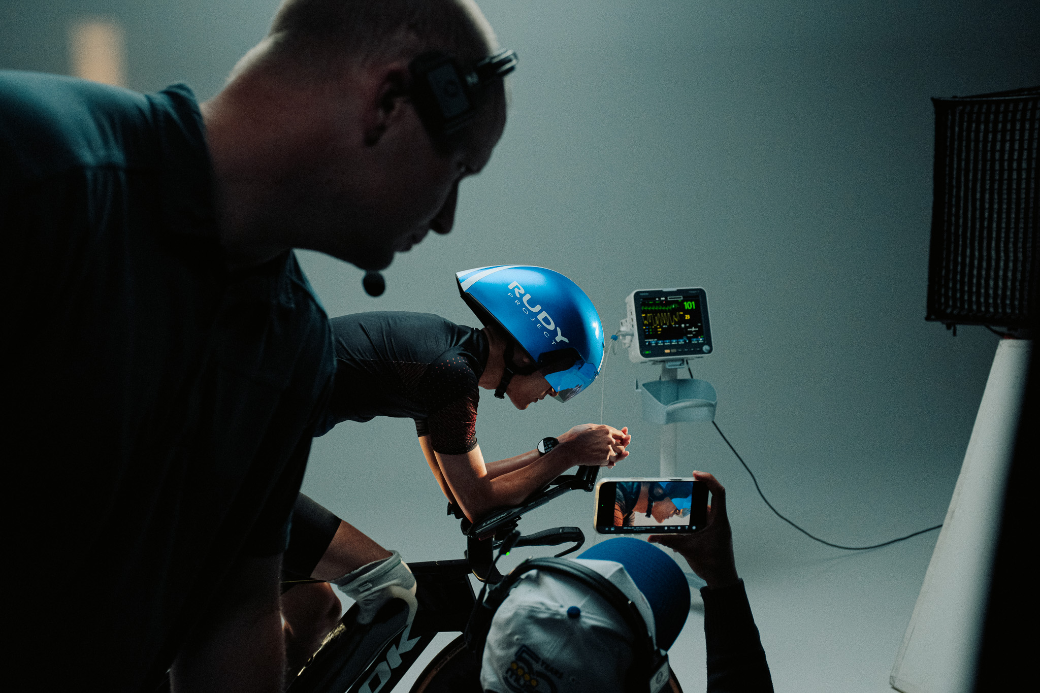 Playback on a phone held up beside Kai mid ride, heart rate monitor behind