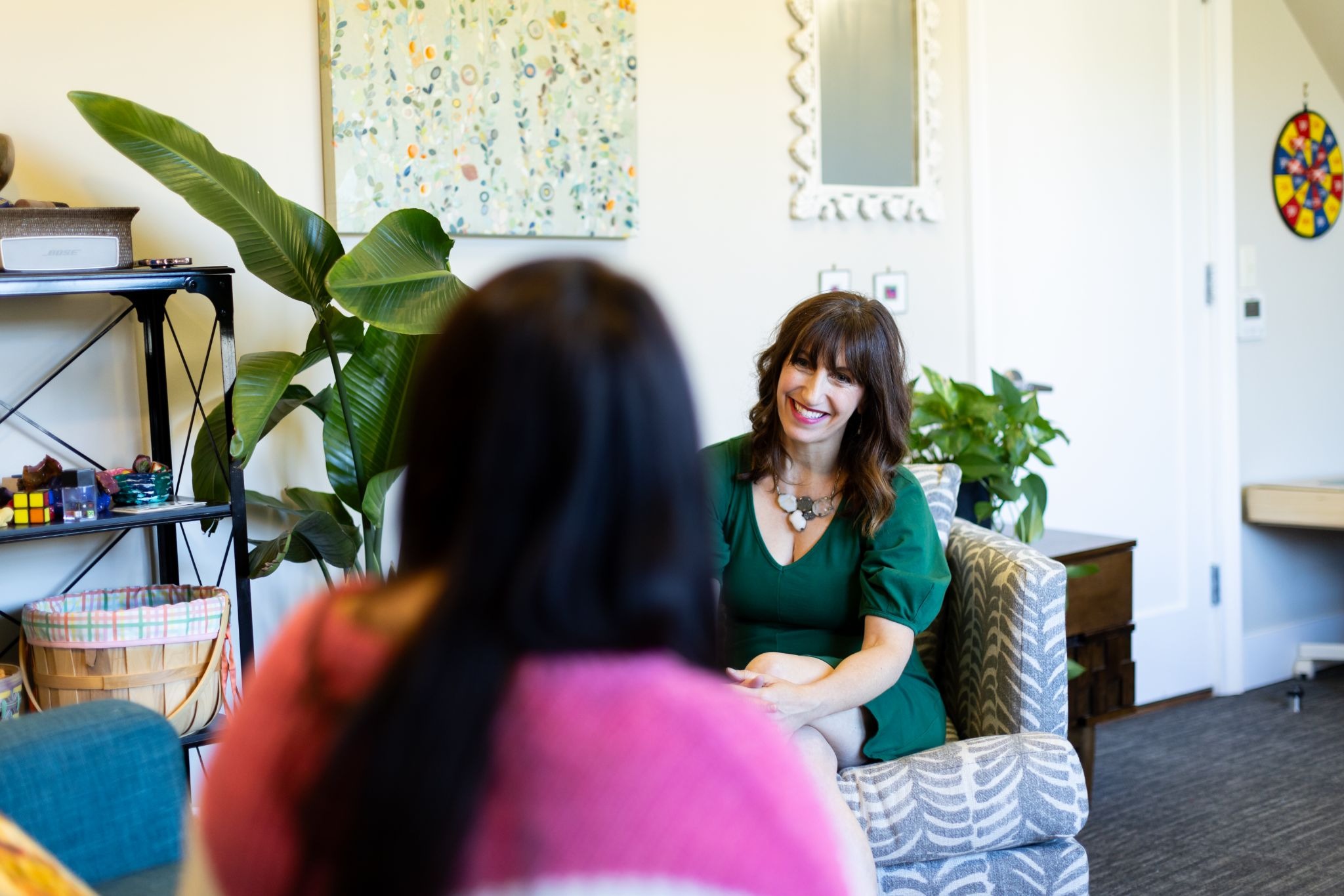 Dr. Jen Joseph providing therapy for chronic pain, perfectionism, and stress-related concerns in her Montclair therapy office.