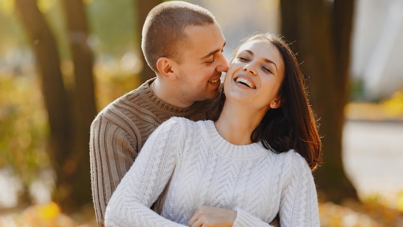 couple hugging in the park