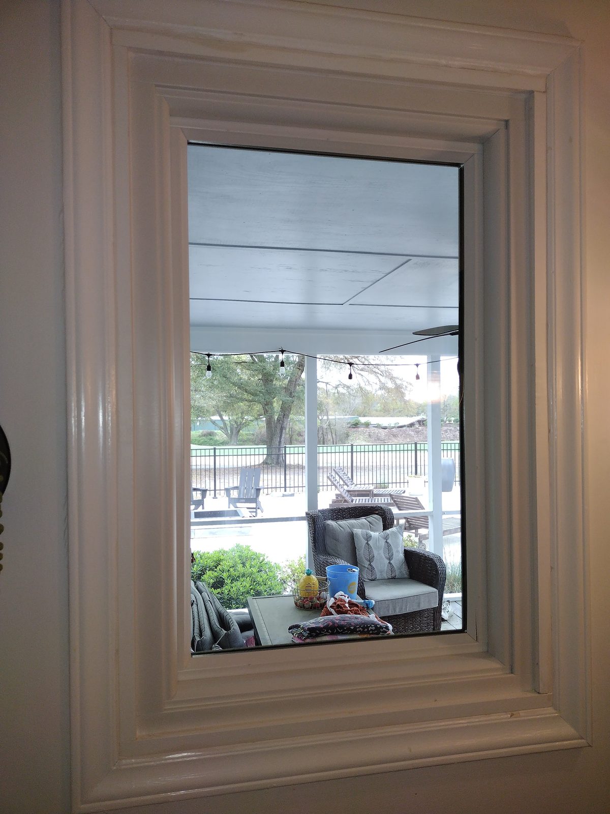 Detailed window casing with layered moulding after repainting
