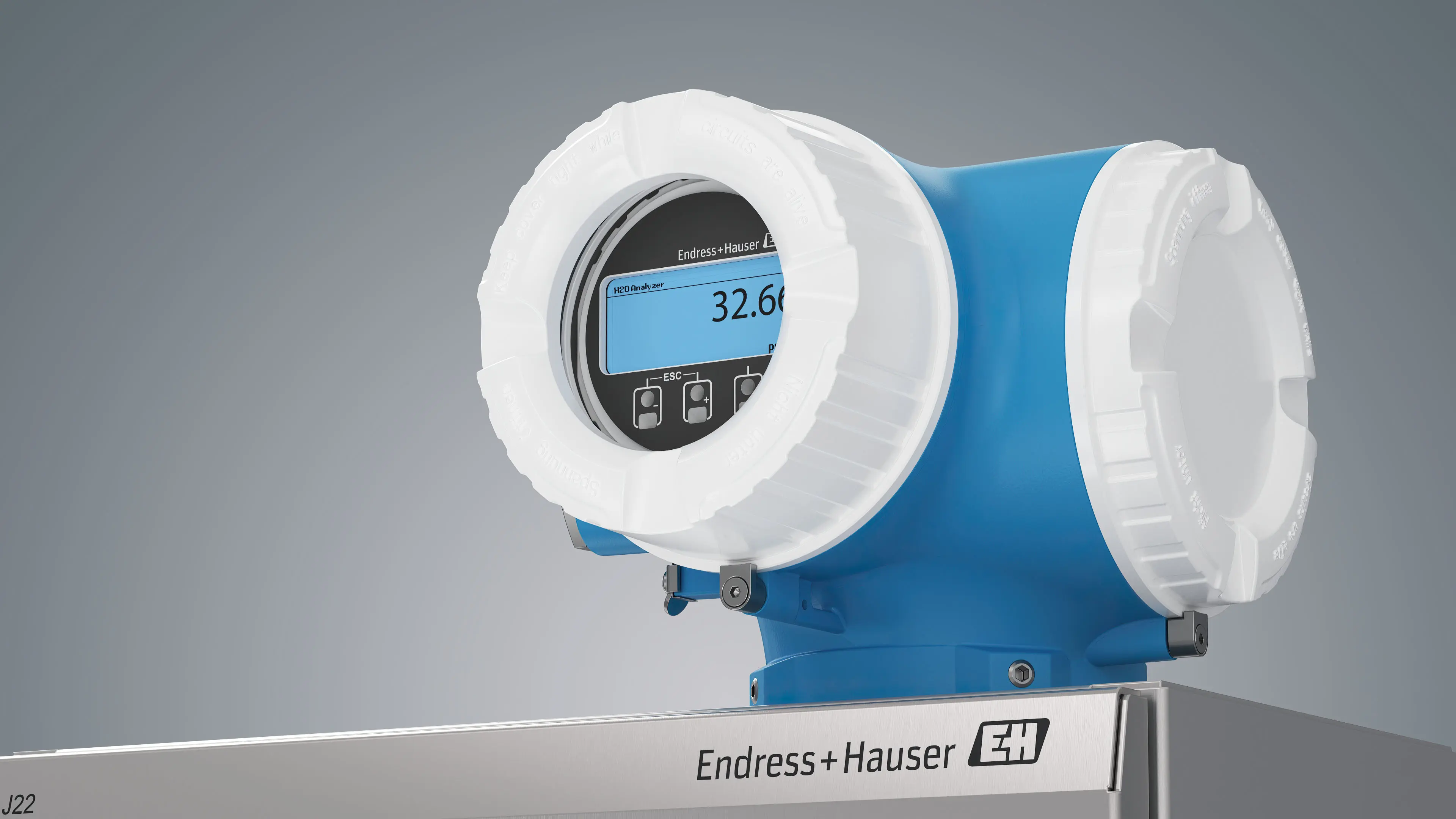 Close-up 3D rendering of industrial H₂O analyzer from Endress+Hauser on stainless enclosure